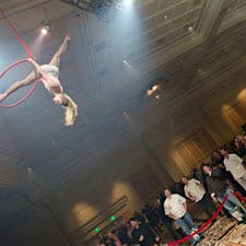 Cirque de Soliel aerialist performed on ribbons high above the floor for all to see.