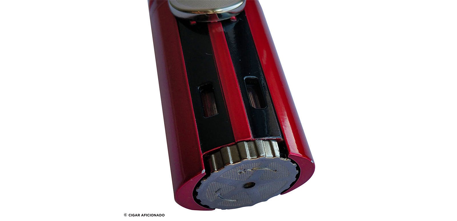 The lighter is equipped with oversized features, including the pull-down ignition and fuel-adjustment wheel.