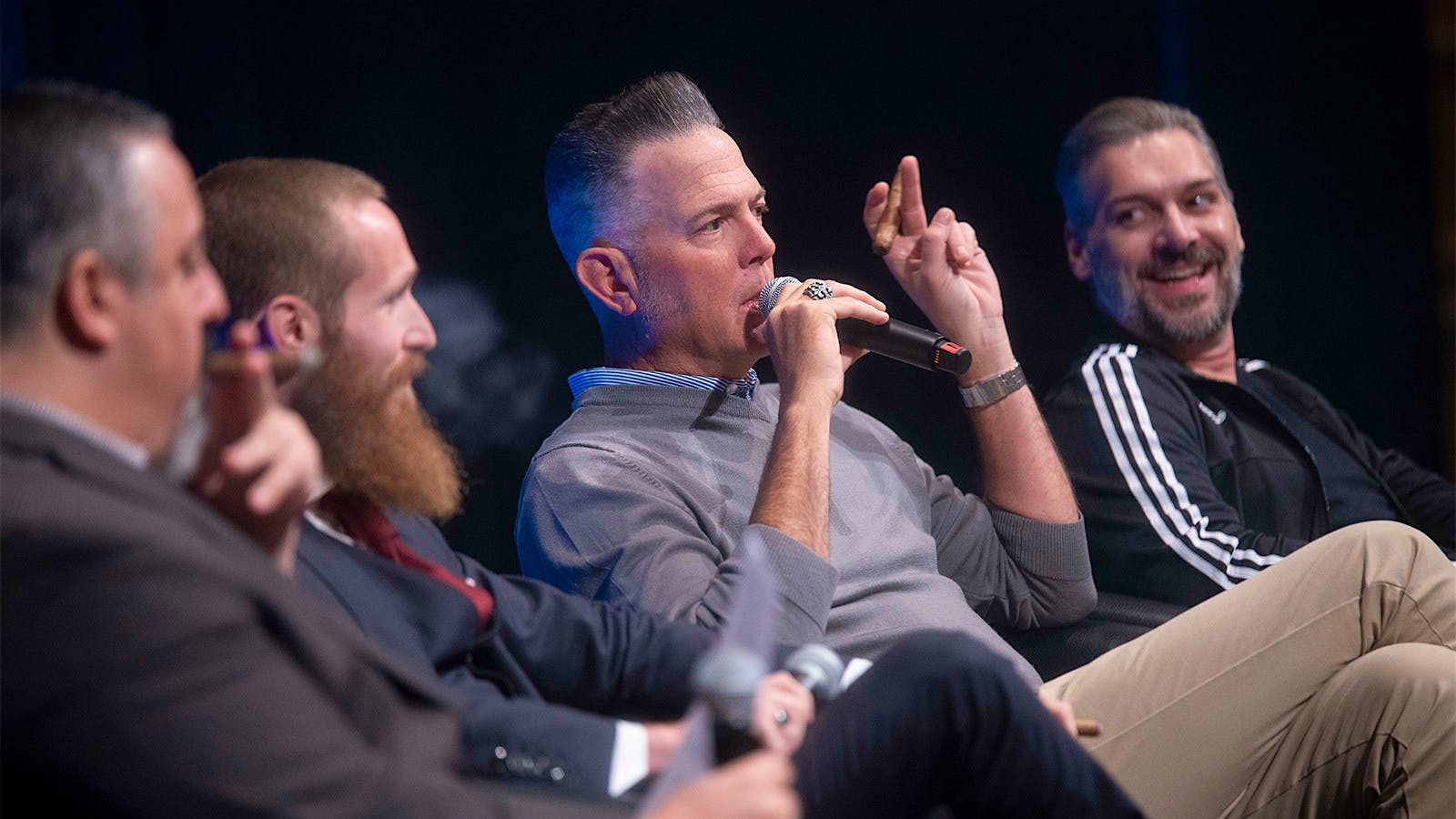 Dion Giolito, center right, draws on conspiracy theories as the inspiration for his Illusione Cigars brand.