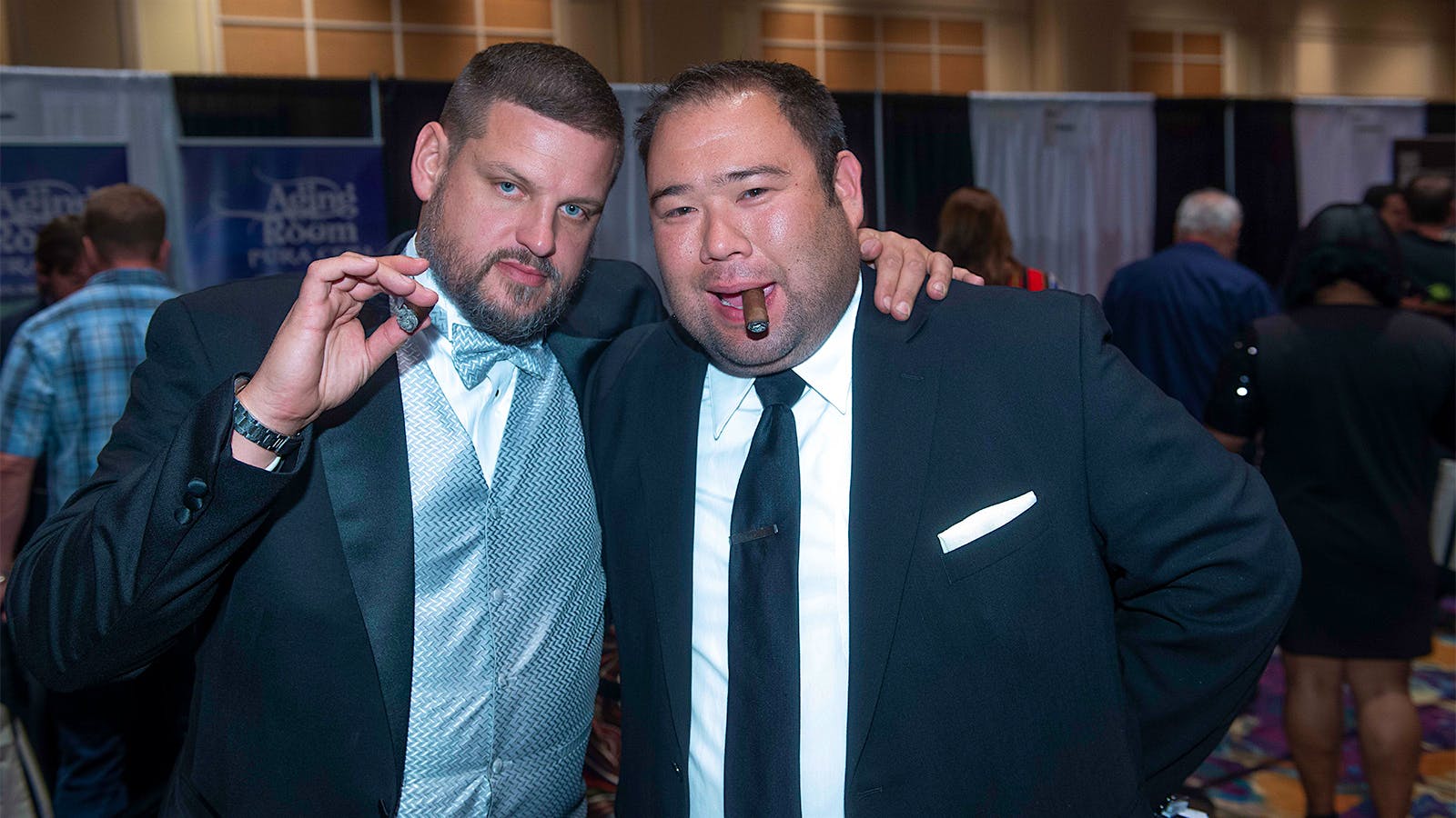 Brian Coerver and Rob Satake looking dapper as they puff away on cigars.